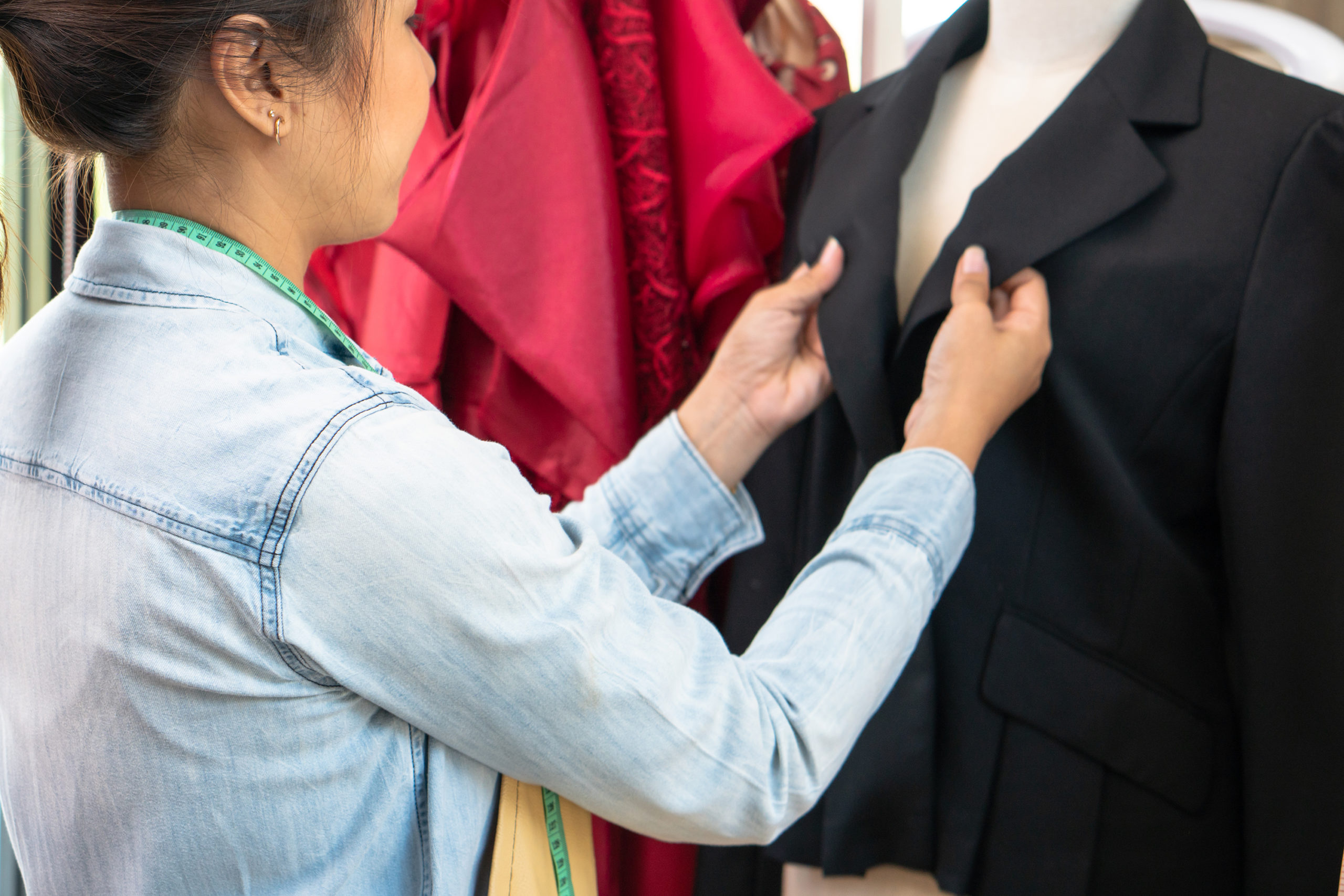 Woman checking garment